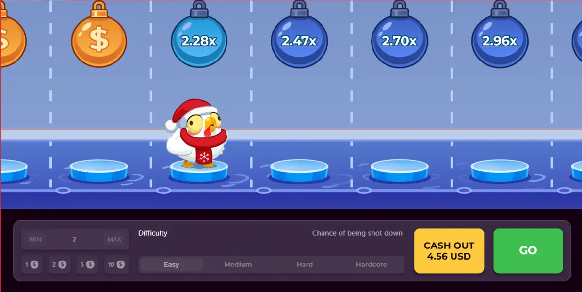 Screenshot of a winter-themed Chicken Road-style game showing a chicken in a Santa hat on icy stepping stones, with hanging multiplier bombs above (2.28x, 2.47x, 2.70x, 2.96x) and a bottom panel for bets and difficulty plus “CASH OUT 4.56 USD” and a green “GO” button.